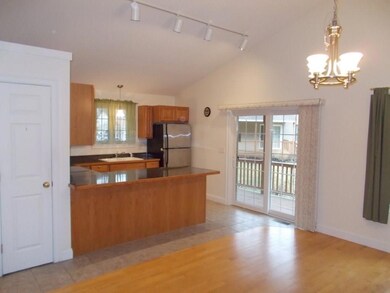 View of U shaped kitchen from the...