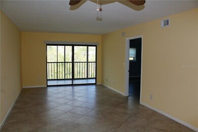 The combination dining/living room opens to Florid