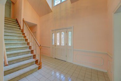 Enter the heart of the home through this 2-story e