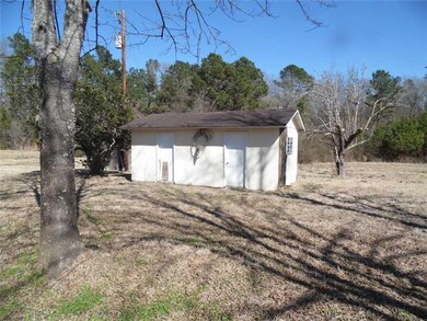 Storage. One of several storage sheds on the prope