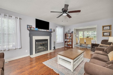 Living room w/wood burning fireplace
