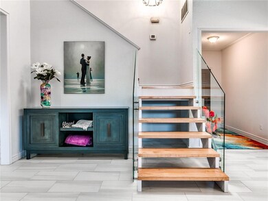Custom maple stairs with spectacular glass rails