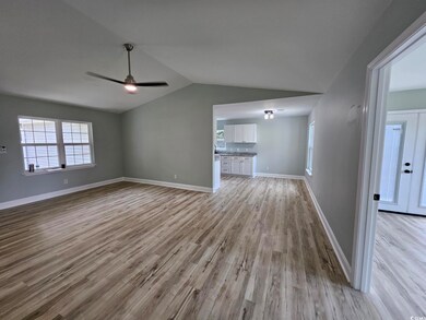 Interior space with light wood-type flooring, ceil