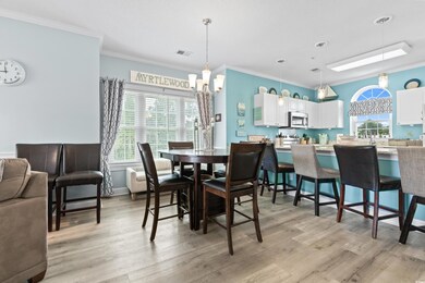 Dining space with a healthy amount of sunlight, li