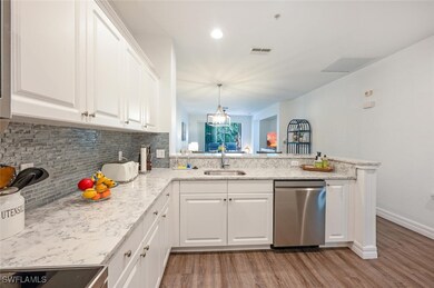 Kitchen featuring wood finished floors, visible ve