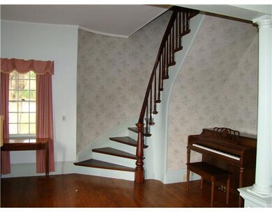 Other. Foyer with curving staircase