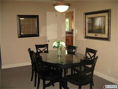 Formal dining outside of kitchen off living room