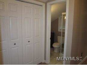 Laundry room to full bath