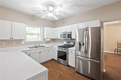 Kitchen with appliances with stainless steel finis