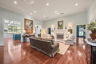 Rich wood floors flow throughout the home.