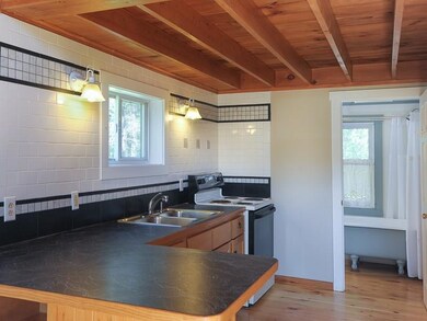 Very clean, cozy kitchen with tile...
