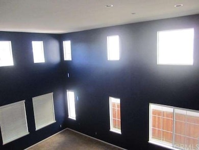 Dramatic formal living room and dining room.