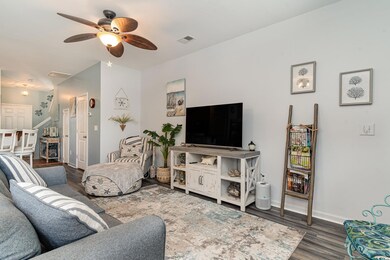 Living room featuring dark hardwood / wood-style f