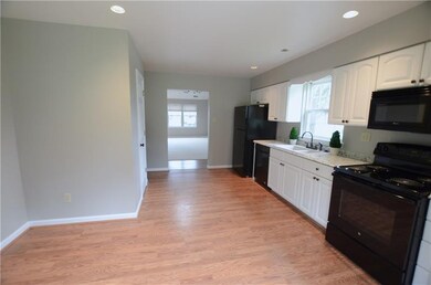 A view of the kitchen from where the table would b