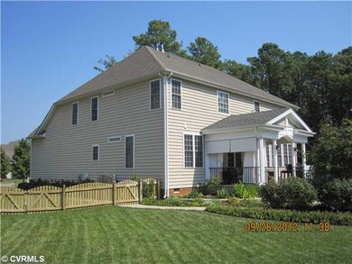 Exterior Back - Huge fenced backyard with brick pa