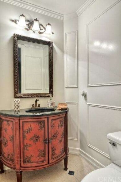 Downstairs powder room with custom decorator sink