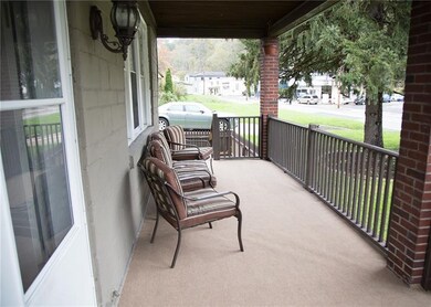 Front porch offers new carpet and place to relax a
