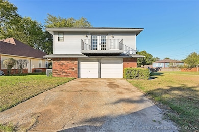 2-car side entry garage and long driveway