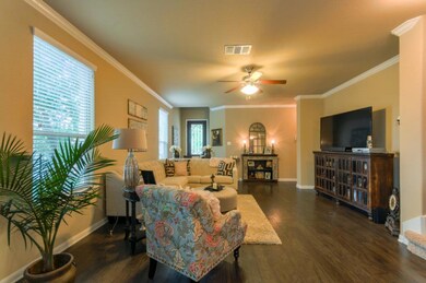 Living room featuring wood finished floors, ceili