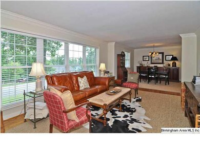 The spacious Living Room opens up into the Dining 