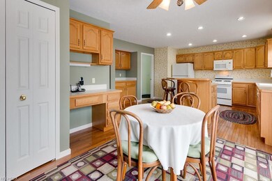 Kitchen offers built-in desk area, coffee station 
