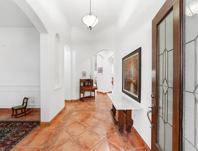 Extended entryway, fresh white paint and all tile throughout. No carpet!