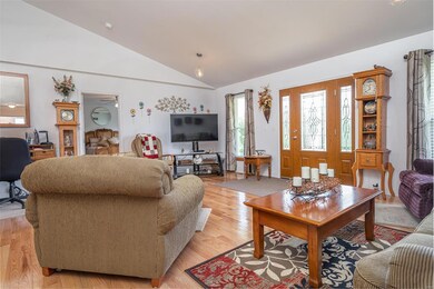 Spacious living room w/hardwood flooring!