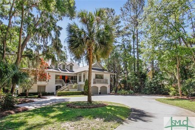 Expansive driveway provides ample guest parking wi