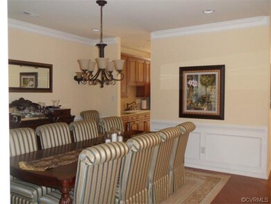 Formal dining room opens to the gourmet ktichen.