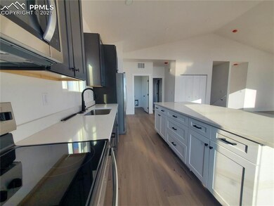 Photo of kitchen from similar home build.