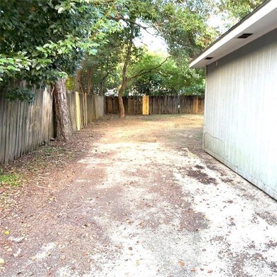 View of fenced backyard