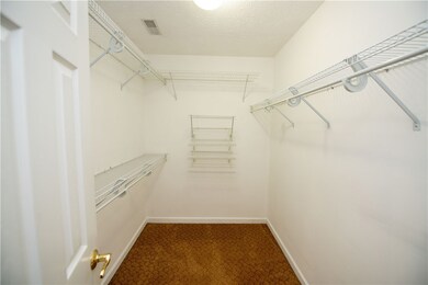 Over-sized walk in closet in the owner's suite.
