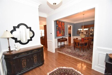 Beautiful foyer with 10' ceilings, lovely hardwood