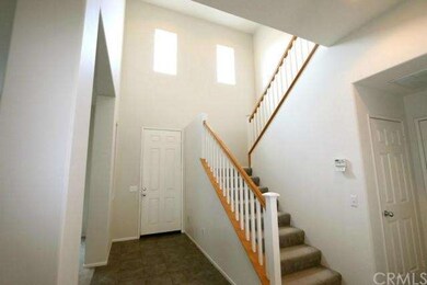 Front door entry, and staircase. Coat closet/huge 