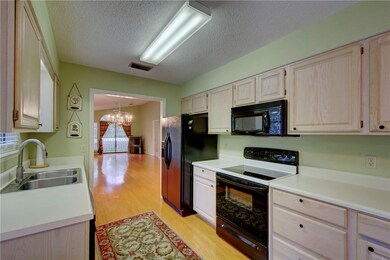 Kitchen is adjacent to the dining room/living room