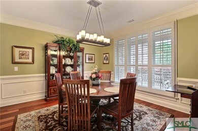 Dining room with plantation shutters throughout th