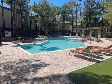 Community pool with a patio area