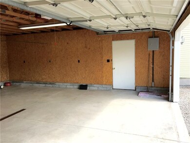 Interior of 2 Car Garage with separate 220 Amp Lin