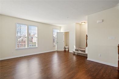 Living Room with access to the Powder Room