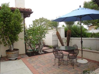 Front Courtyard with sitting wall