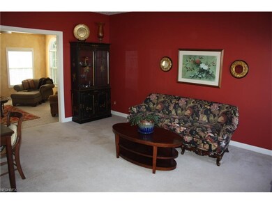 Foyer opens to Living room.  Step down to Family r