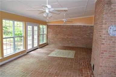 The Florida Room is huge, has Anderson Windows, an