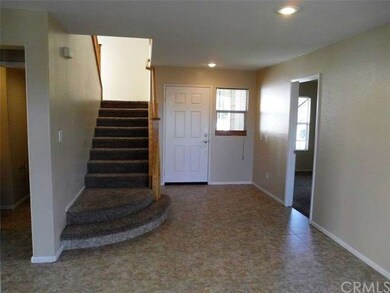 Standing in entry looking back towards front door.
