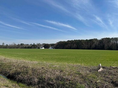 View of landscape with a rural view and a wooded v