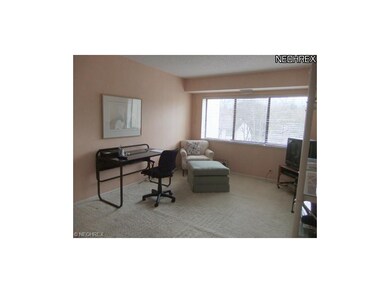 Bedroom 1 is located off of the living room and fe