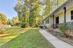 View of yard with a porch