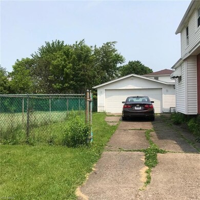 Large 2 car garage with attached workshop/storage/