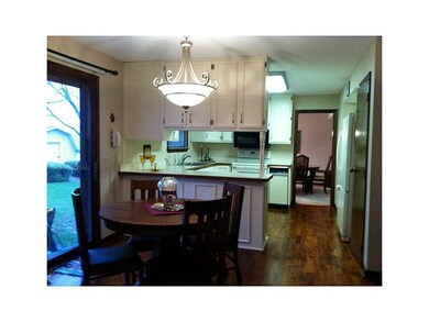 Kitchen. Open kitchen with Acacia Walnut floor to 