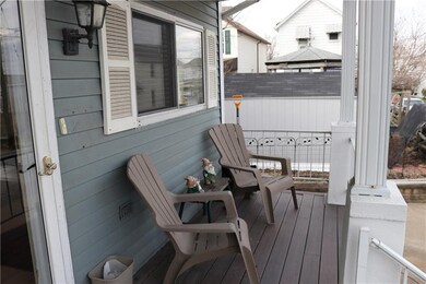 Cute Covered Front Porch with newer composite deck