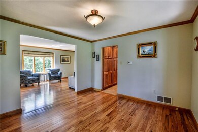 Gracious dining room also with hardwood flooring o
